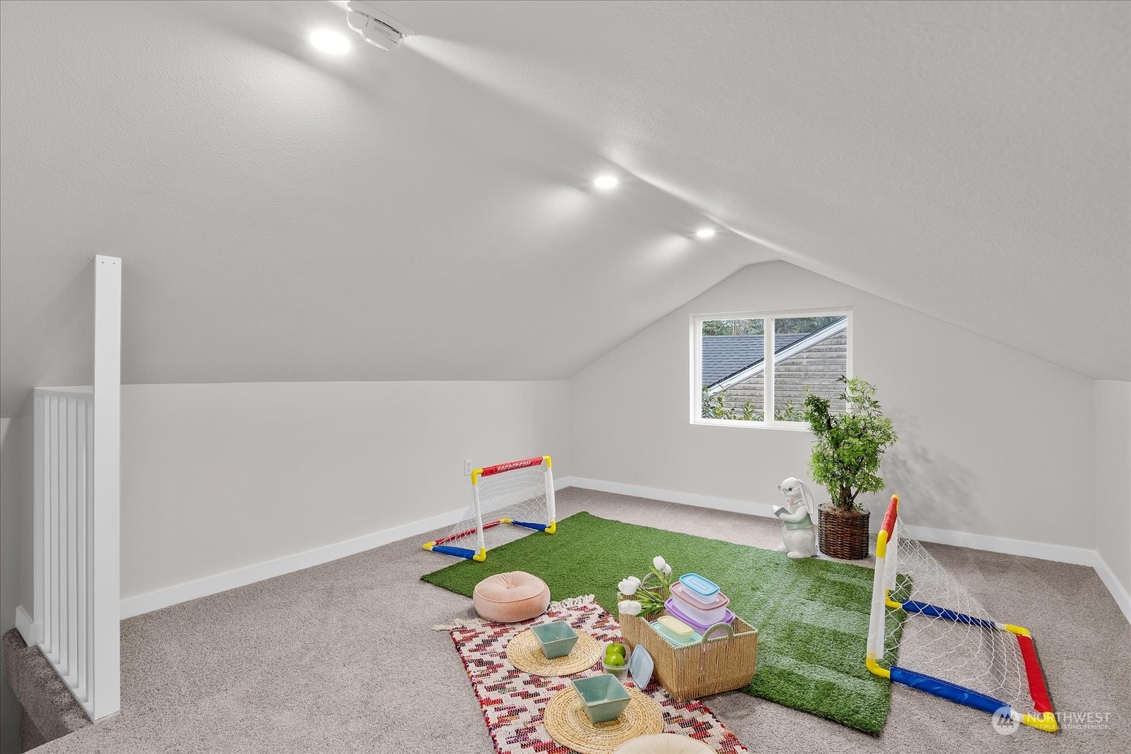 6919 Cady Road Everett, WA 98203 - Photo 23 of 39 a room with toys and flowers