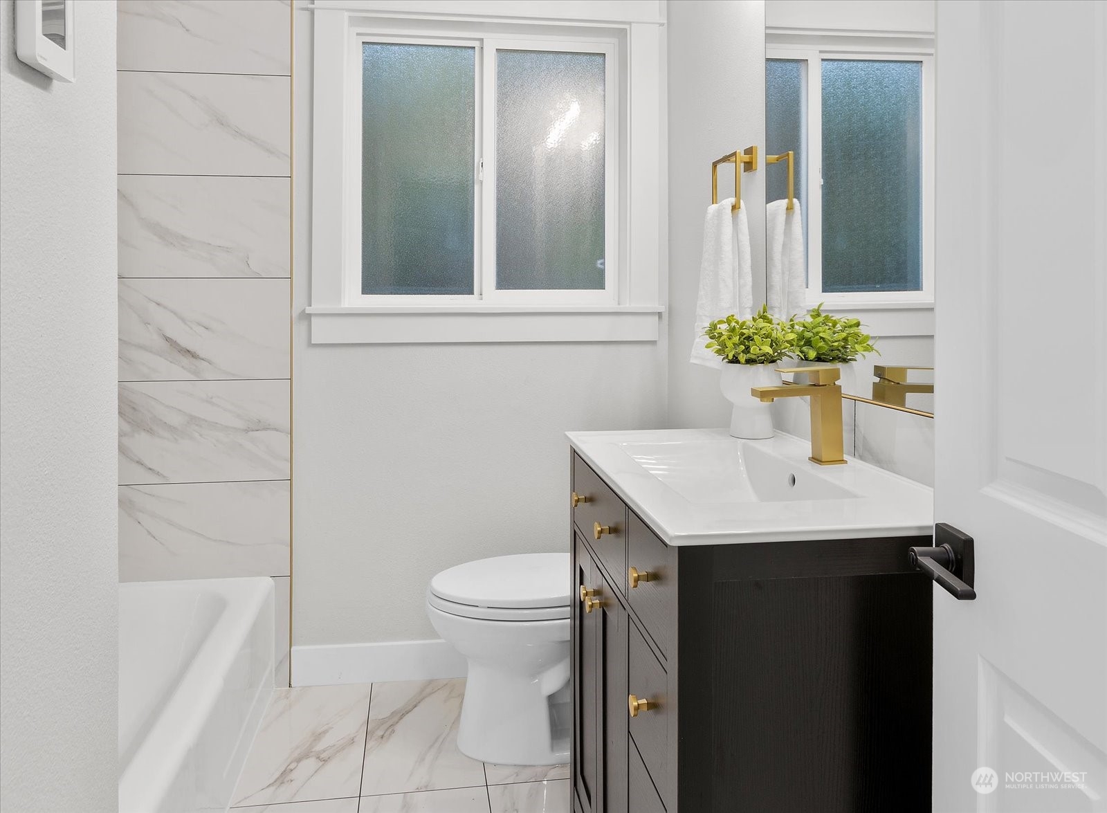 6919 Cady Road Everett, WA 98203 - Photo 25 of 39 a bathroom with a sink a toilet and shower