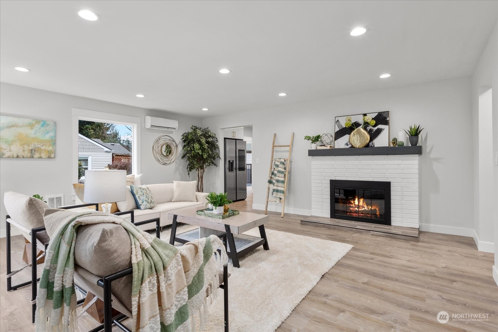 6919 Cady Road Everett, WA 98203 - Photo 3 of 39 a living room with furniture and a fireplace