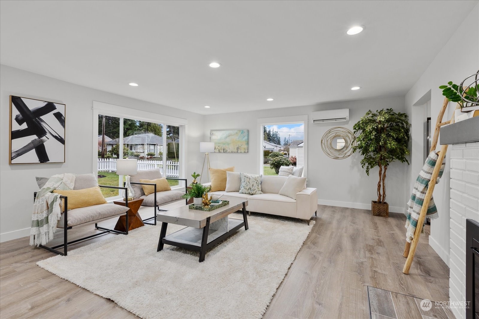 6919 Cady Road Everett, WA 98203 - Photo 4 of 39 a living room with furniture and a potted plant