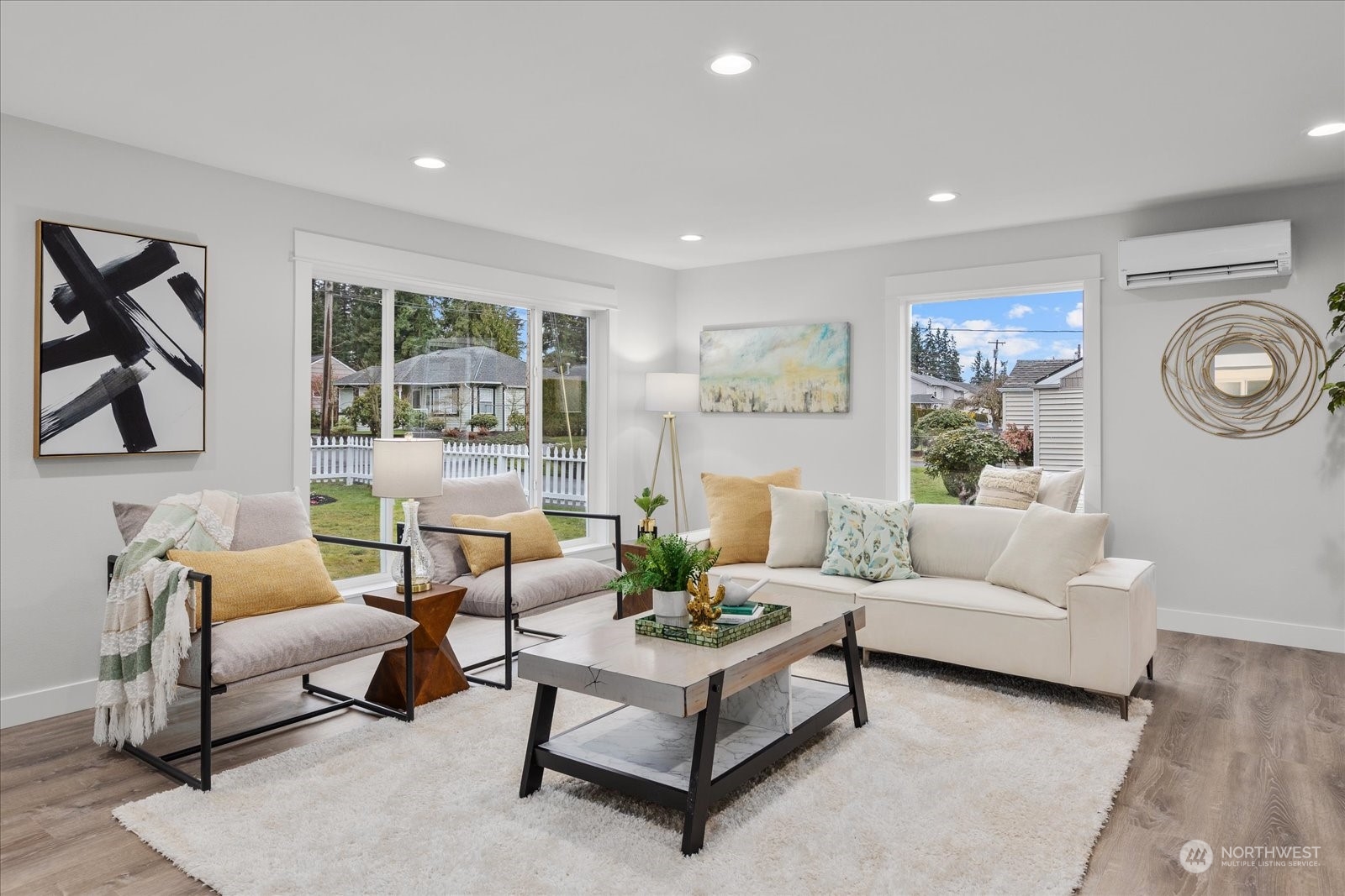 6919 Cady Road Everett, WA 98203 - Photo 7 of 39 a living room with furniture and a clock