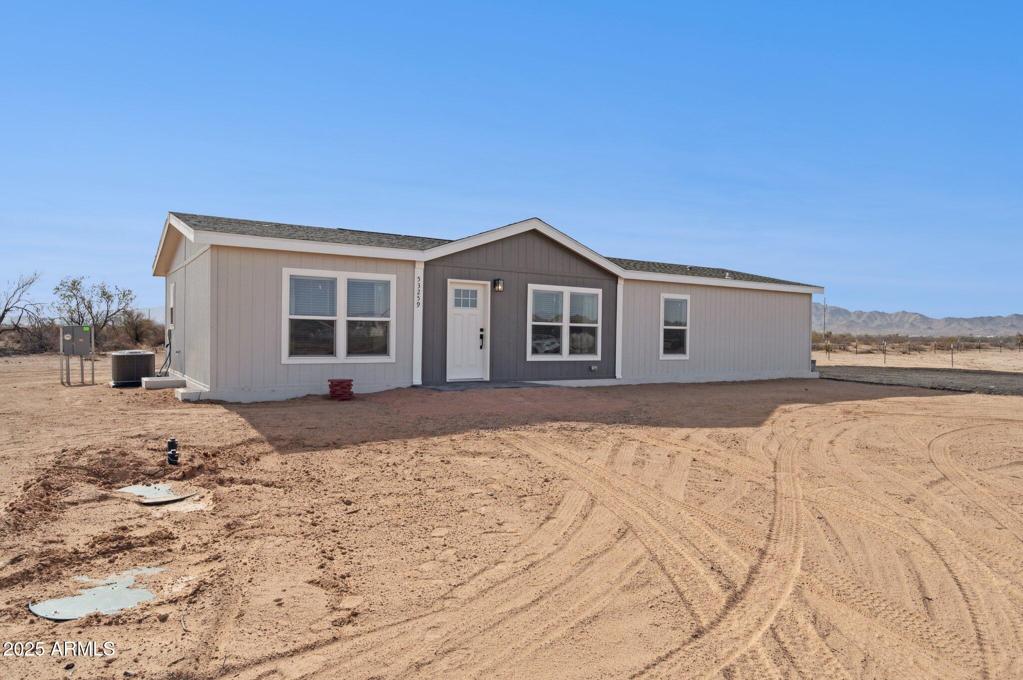 53259 West Barn Owl Road Maricopa, AZ 85139 - Photo 6 of 38 2-web-or-mls-51090-w-barnes-rd