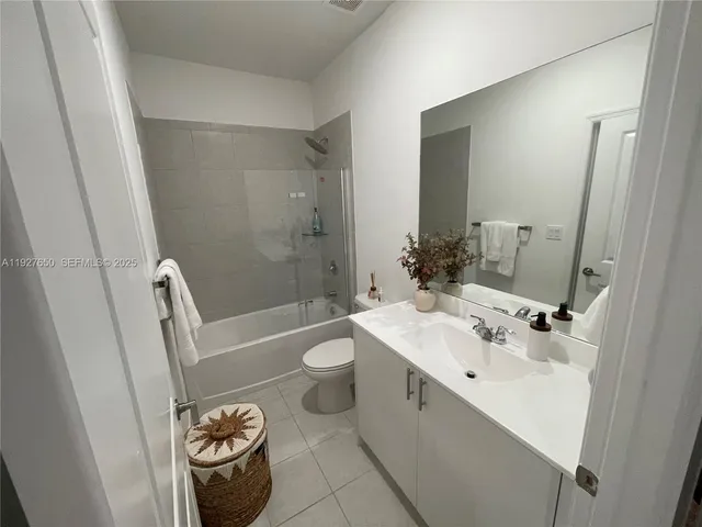 a view of a kitchen with washer and dryer