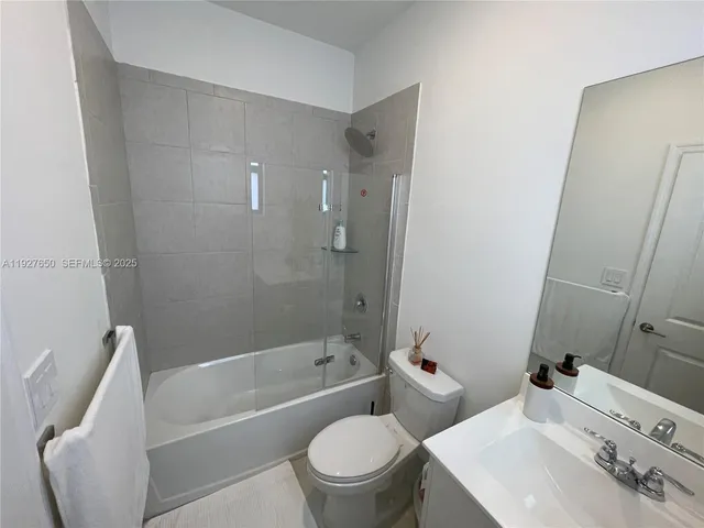 a table and chairs in the garden