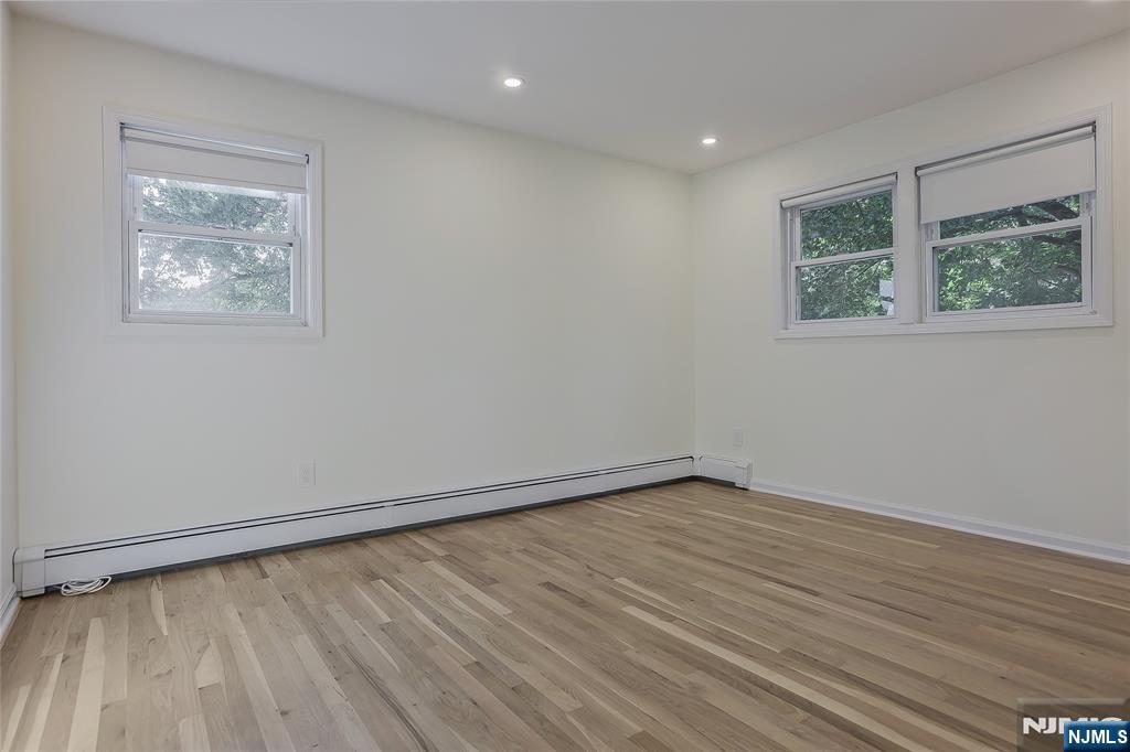 18 Ruth Lane Demarest, NJ 07627 - Photo 16 of 35 an empty room with a window