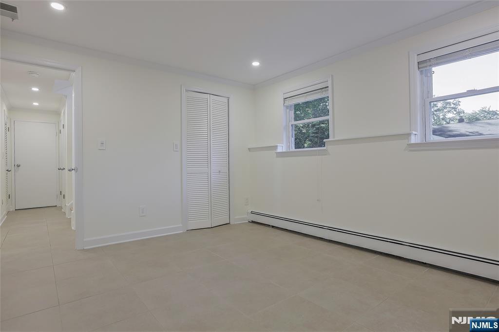 18 Ruth Lane Demarest, NJ 07627 - Photo 23 of 35 an empty room with windows