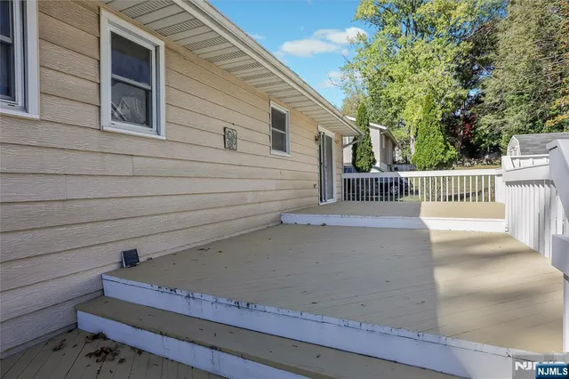 a view of a back yard of the house