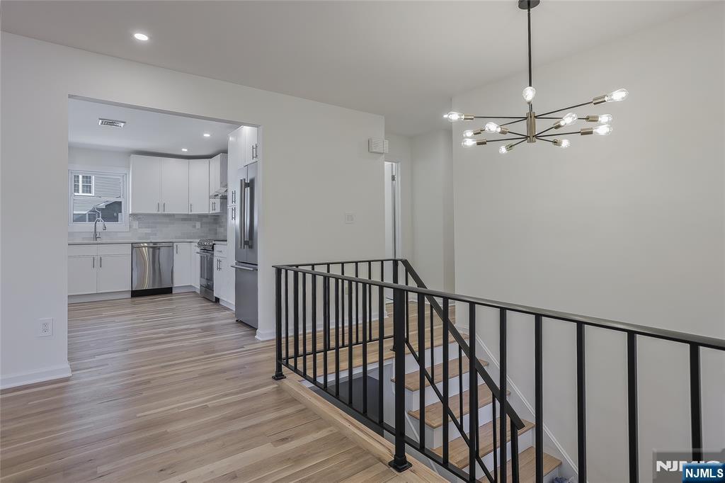 18 Ruth Lane Demarest, NJ 07627 - Photo 4 of 35 a view of a kitchen from the hallway