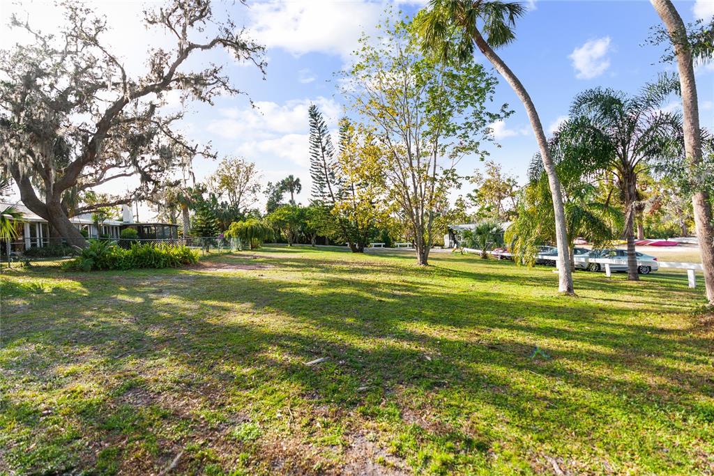 1285 Hagle Park Road Bradenton, FL 34212 - Photo 43 of 74 a view of a park with large trees