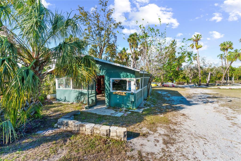 1285 Hagle Park Road Bradenton, FL 34212 - Photo 55 of 74 a view of a house with backyard