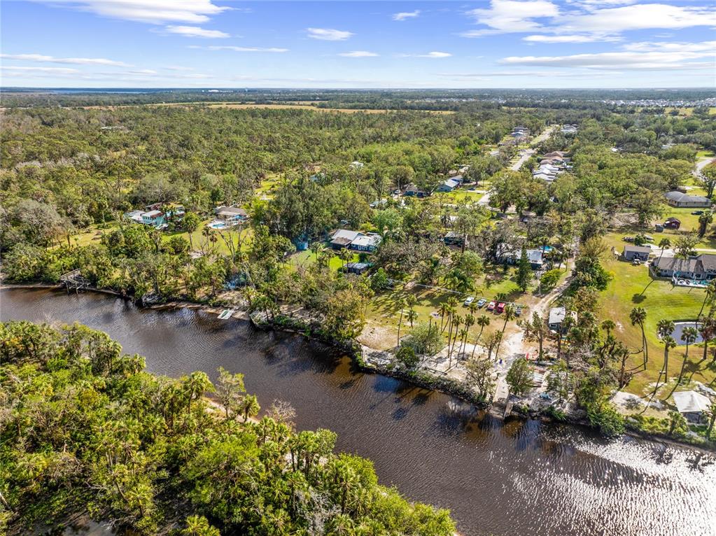 1285 Hagle Park Road Bradenton, FL 34212 - Photo 66 of 74 an aerial view of residential houses with outdoor space