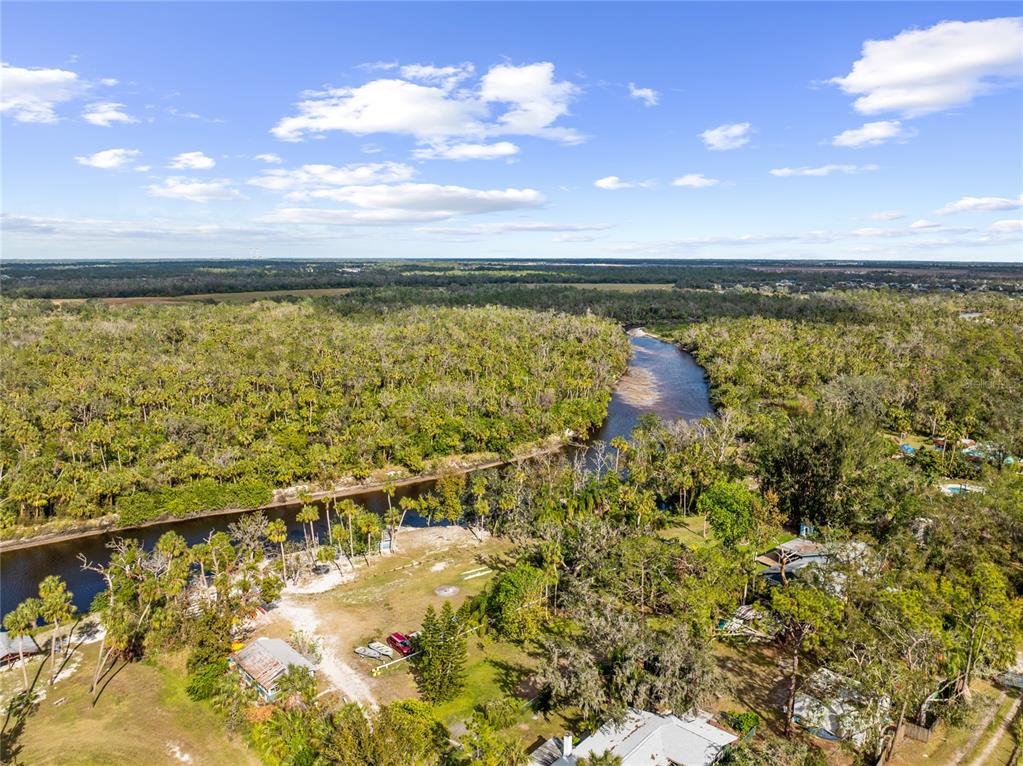 1285 Hagle Park Road Bradenton, FL 34212 - Photo 68 of 74 a view of a lake with a city