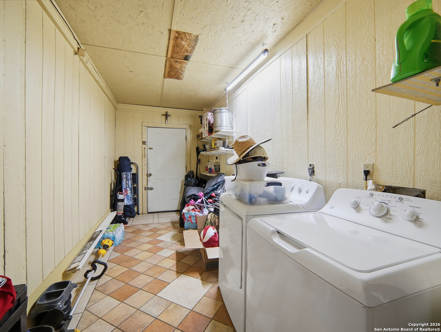 17525 Benton City Road Von Ormy, TX 78073 - Photo 21 of 36 a utility room with dryer and washer