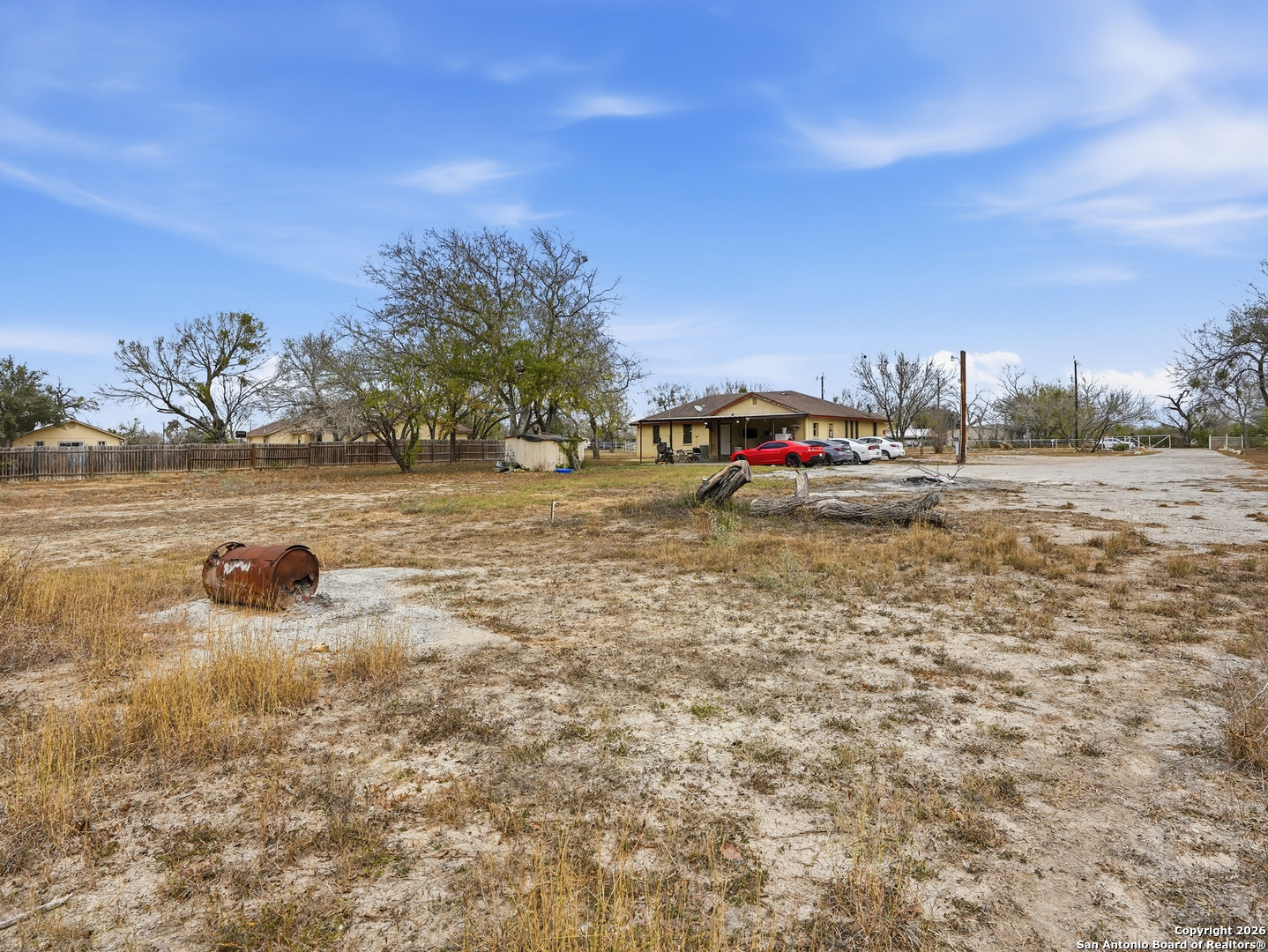 17525 Benton City Road Von Ormy, TX 78073 - Photo 24 of 36 a view of a lake with houses