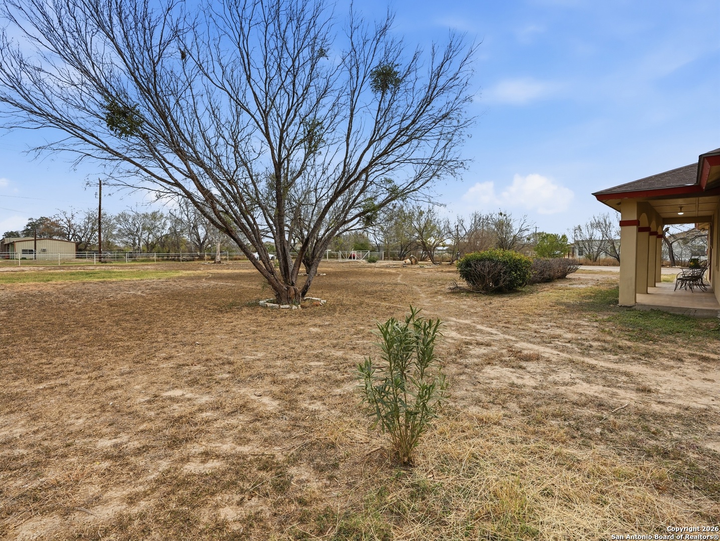 17525 Benton City Road Von Ormy, TX 78073 - Photo 28 of 36 a view of outdoor space with trees