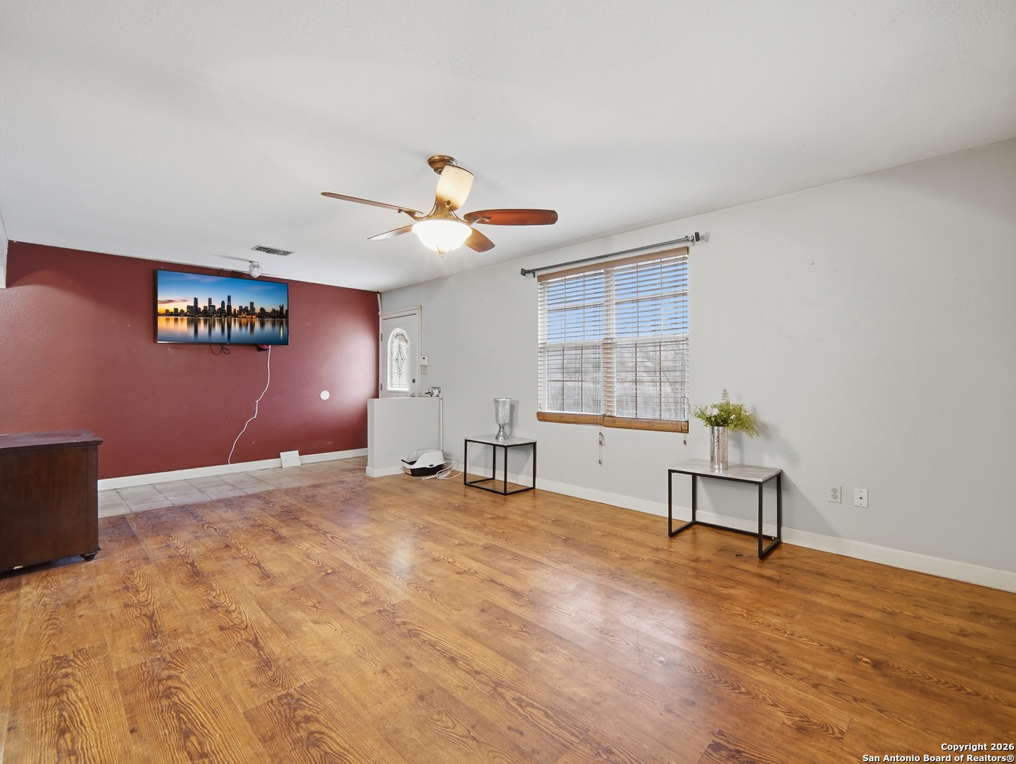 17525 Benton City Road Von Ormy, TX 78073 - Photo 5 of 36 a view of an empty room with a window