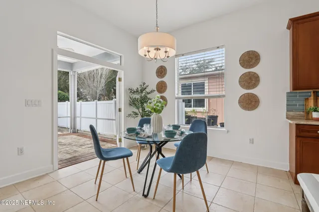 a kitchen with stainless steel appliances granite countertop a stove top oven a sink dishwasher and cabinets