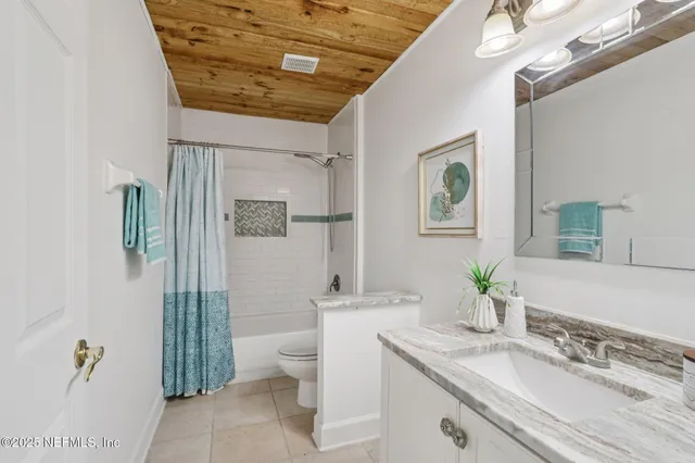 a view of a livingroom with furniture and window
