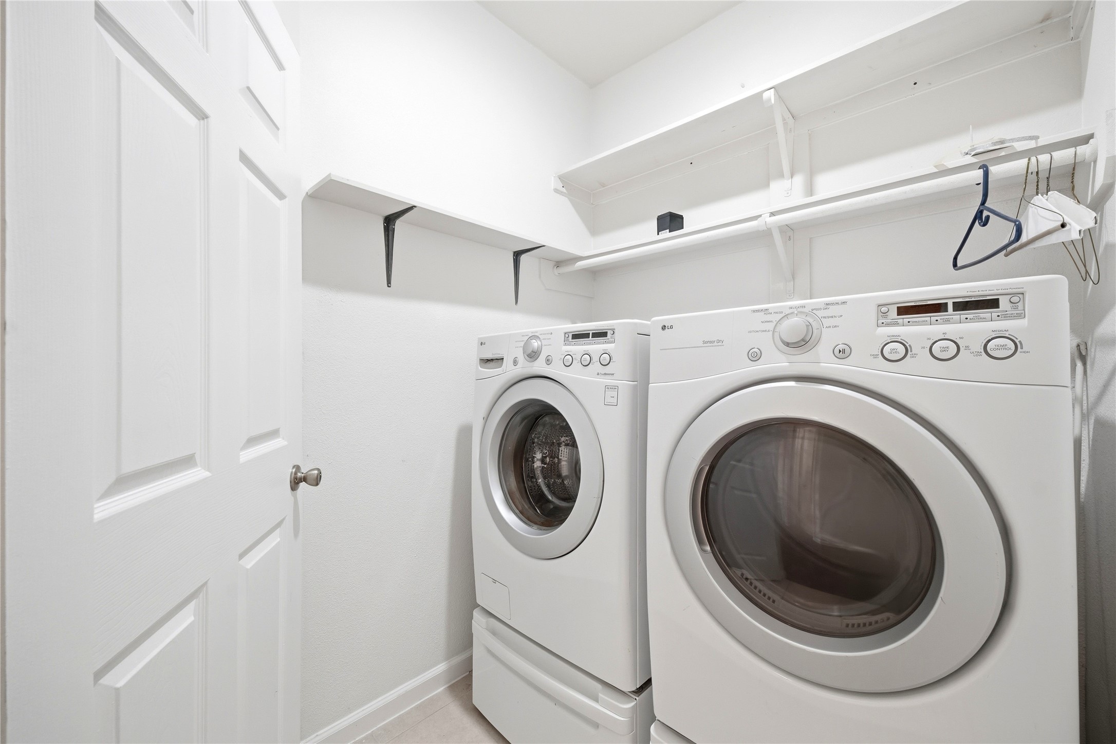 5411 Gate Canyon Court Spring, TX 77373 - Photo 32 of 33 a utility room with dryer and washer