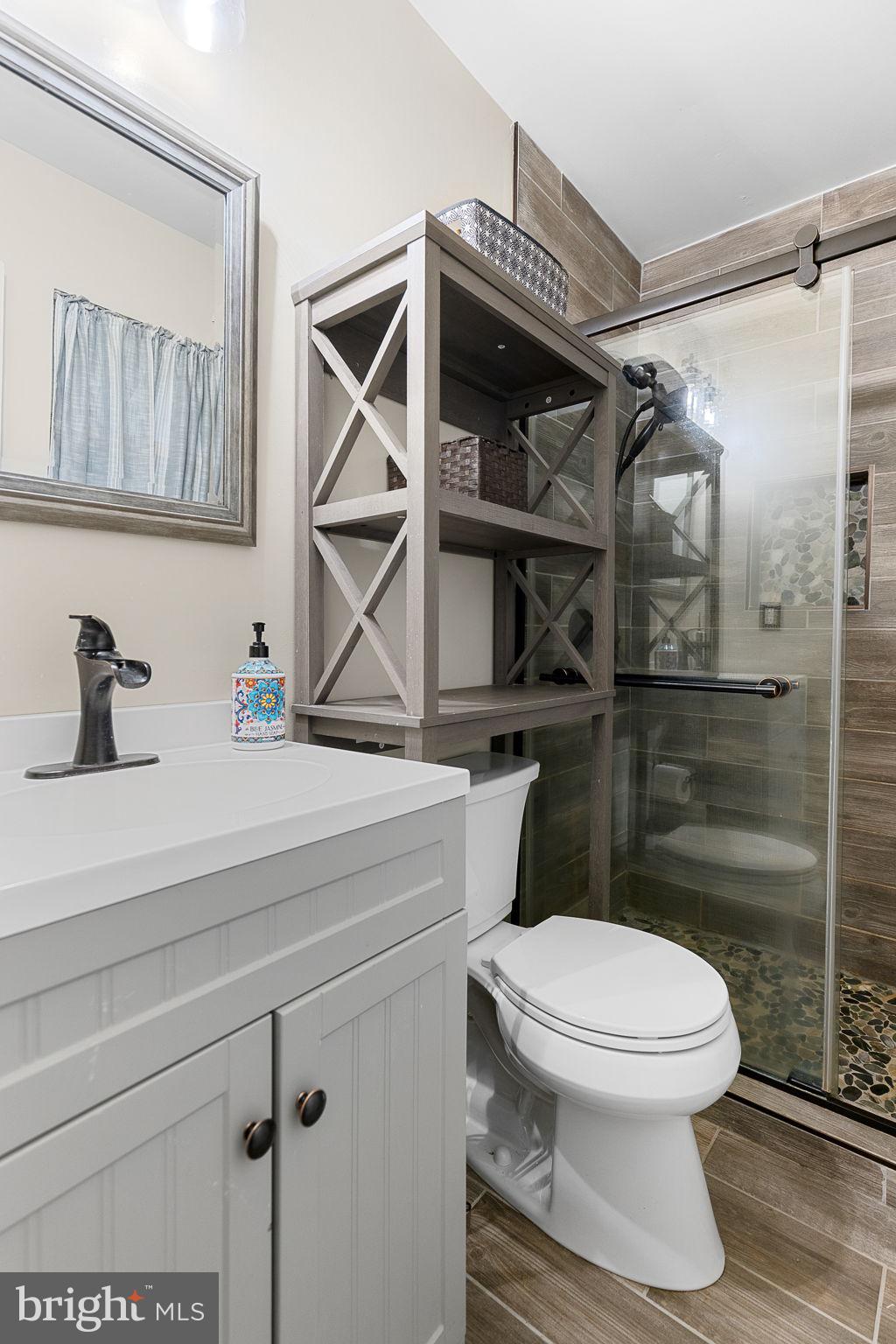 6199 Curtis Circle King George, VA 22485 - Photo 14 of 33 a bathroom with a toilet and a shower