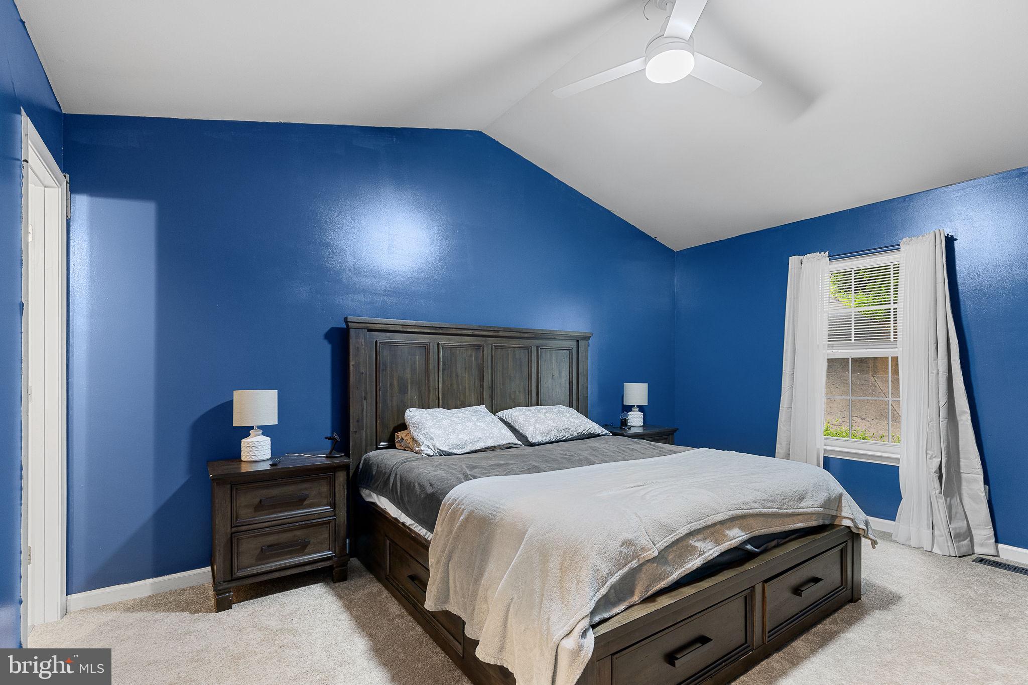 6199 Curtis Circle King George, VA 22485 - Photo 16 of 33 a bedroom with a bed and a window