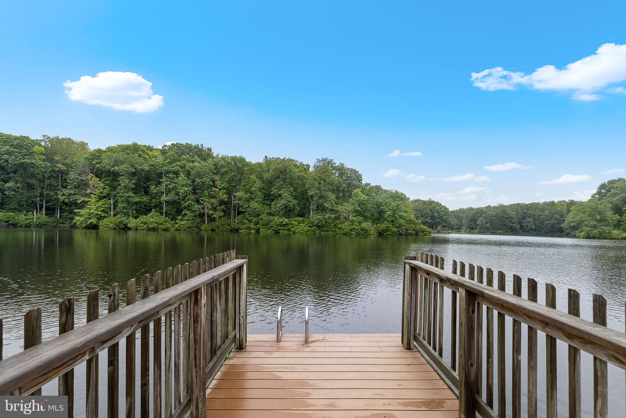 6199 Curtis Circle King George, VA 22485 - Photo 25 of 33 a view of a lake from a balcony