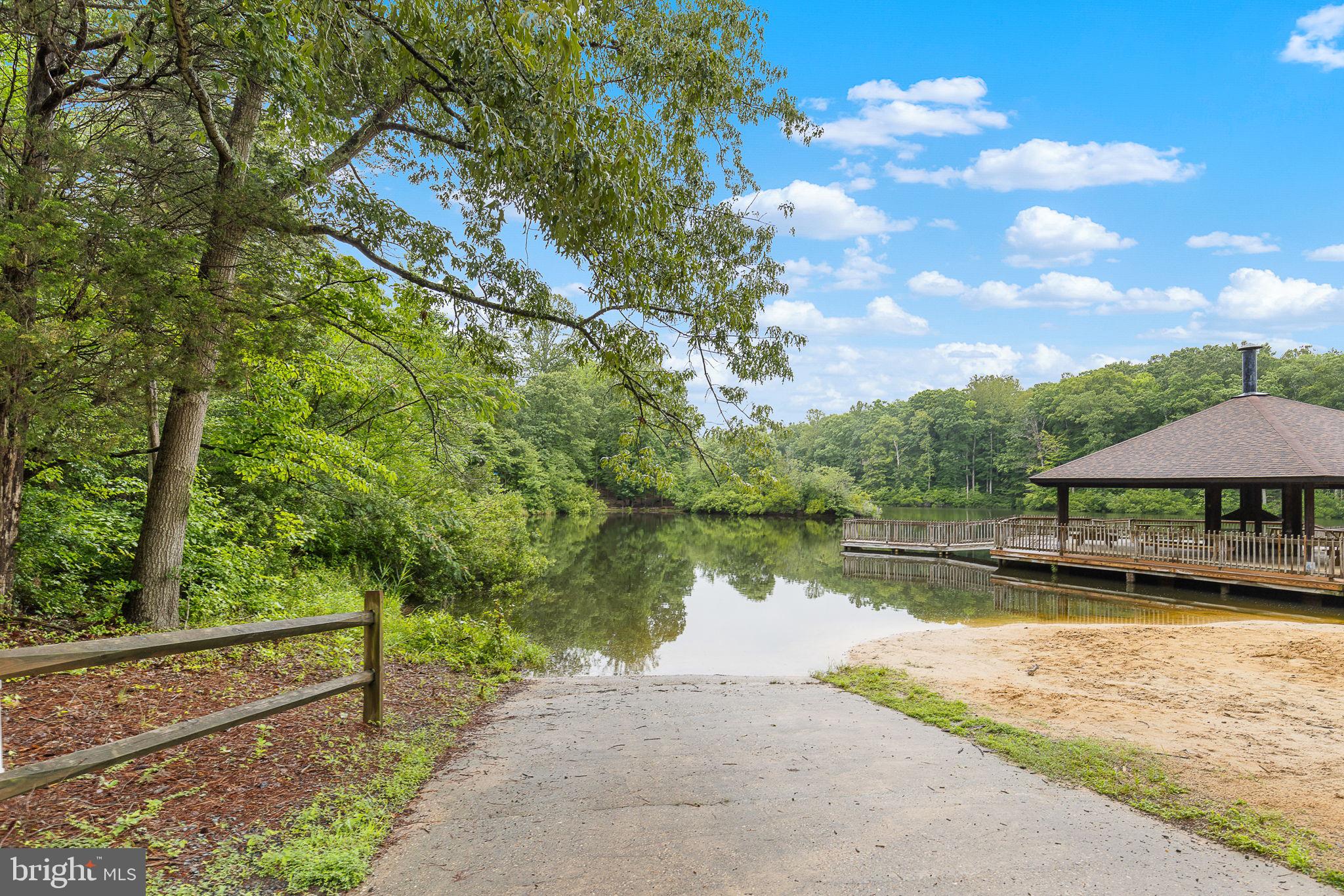 6199 Curtis Circle King George, VA 22485 - Photo 30 of 33 a view of a lake with houses