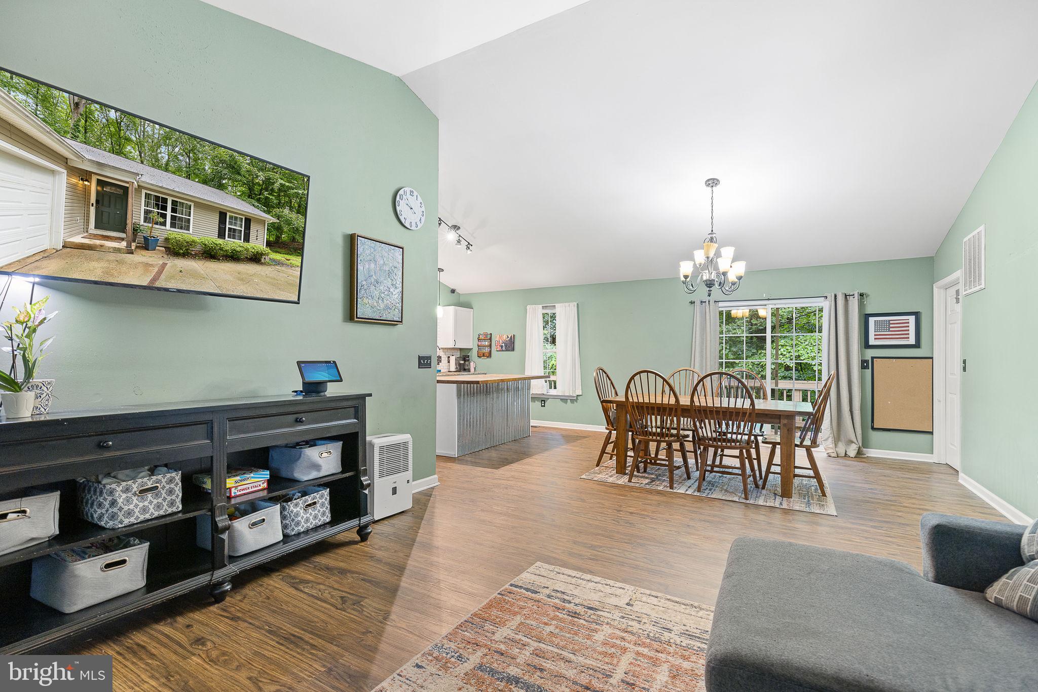 6199 Curtis Circle King George, VA 22485 - Photo 4 of 33 a living room with furniture and a wooden floor