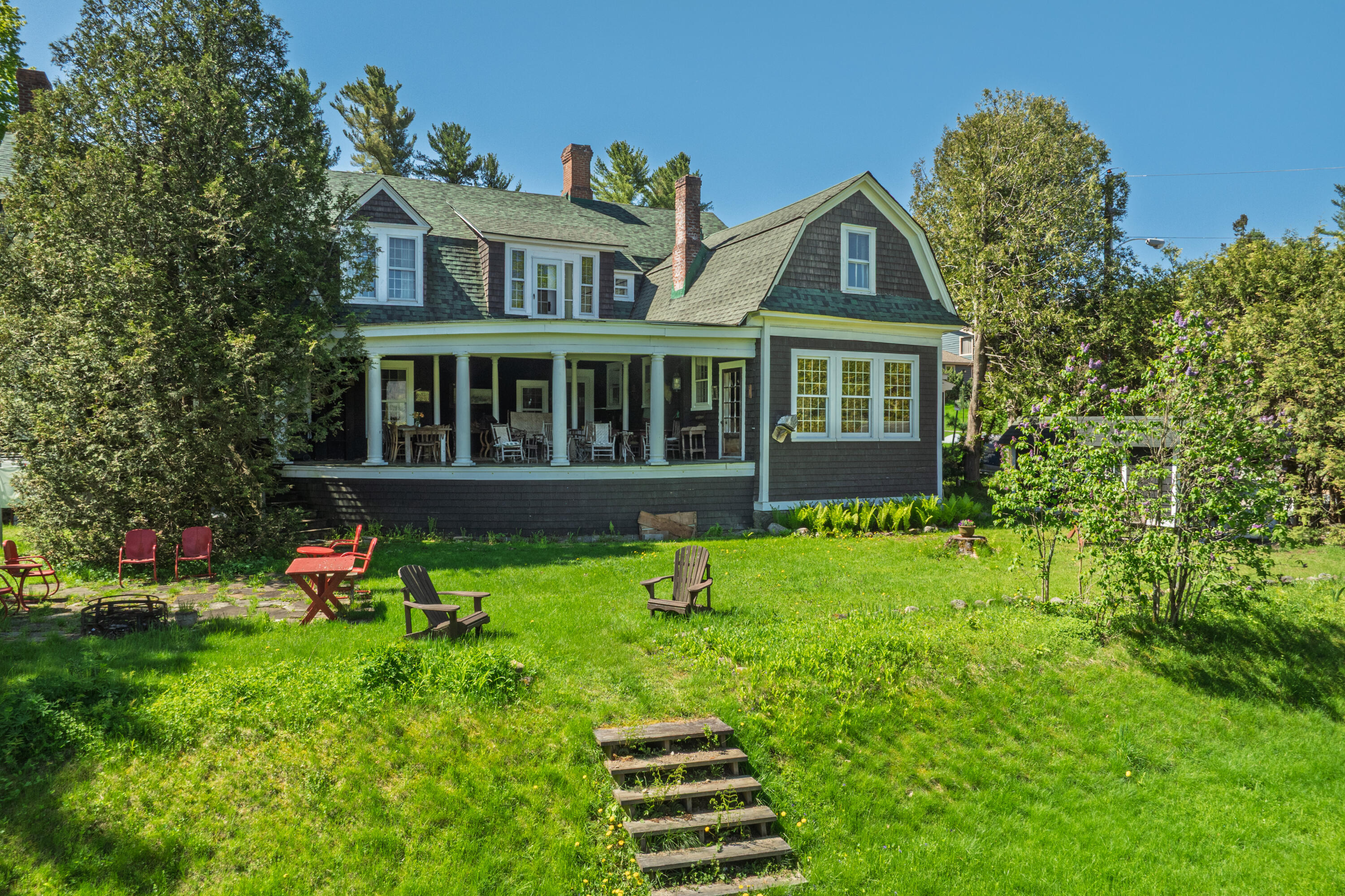 190 Stevens Road Lake Placid, NY 12946 - Photo 5 of 32 Rear of house with expansive porch