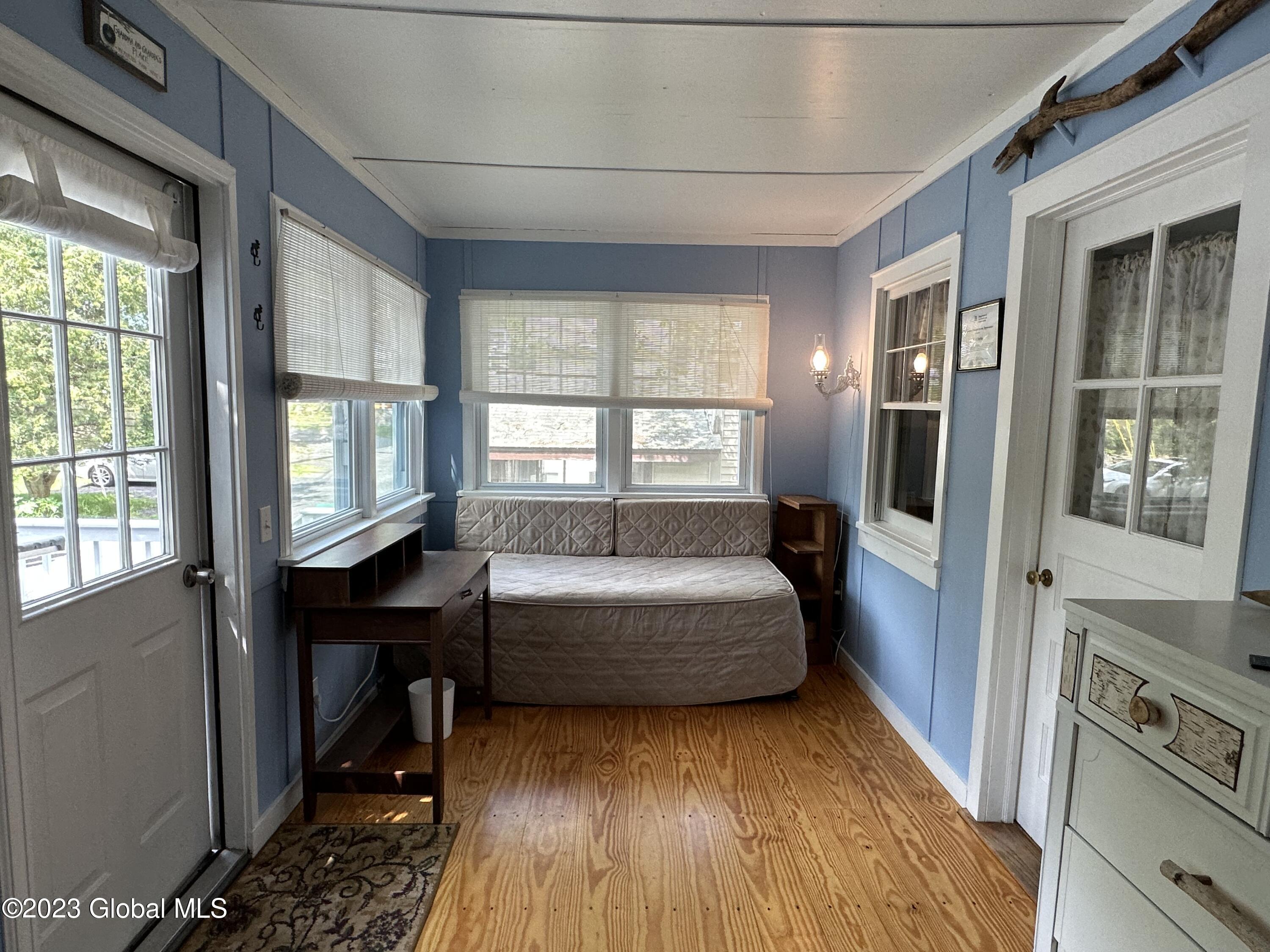 6325 Sunset Bay Road Dresden, NY 12841 - Photo 13 of 21 enclosed porch