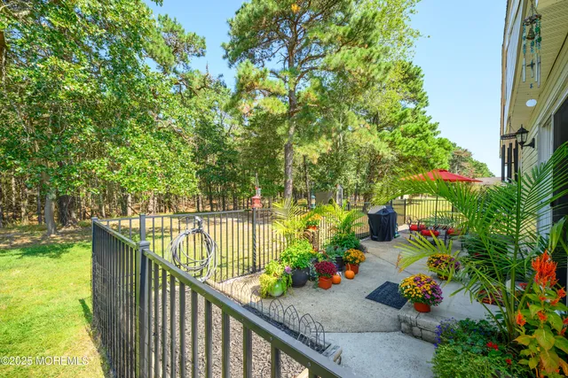 a view of a balcony with chairs