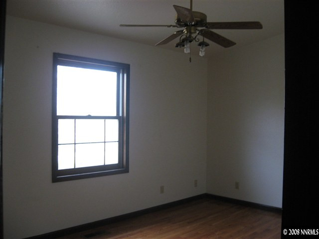 5700 Rebel Cause Road, Unit 1 Reno, NV 89510 - Photo 3 of 7 an empty room with a window