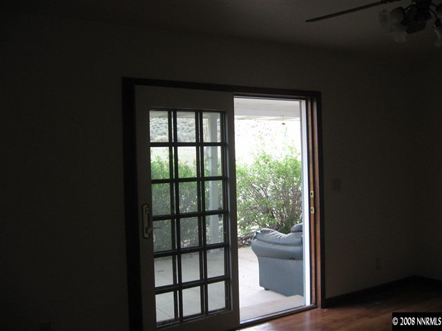 5700 Rebel Cause Road, Unit 1 Reno, NV 89510 - Photo 4 of 7 a view of a glass door and a living room