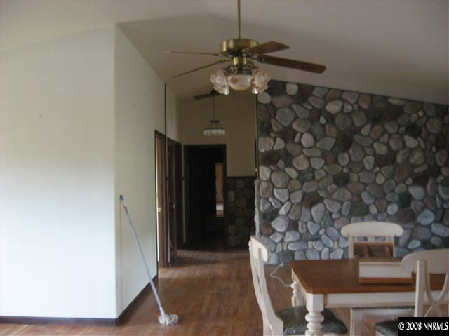 5700 Rebel Cause Road, Unit 1 Reno, NV 89510 - Photo 6 of 7 a dining room with furniture and chandelier