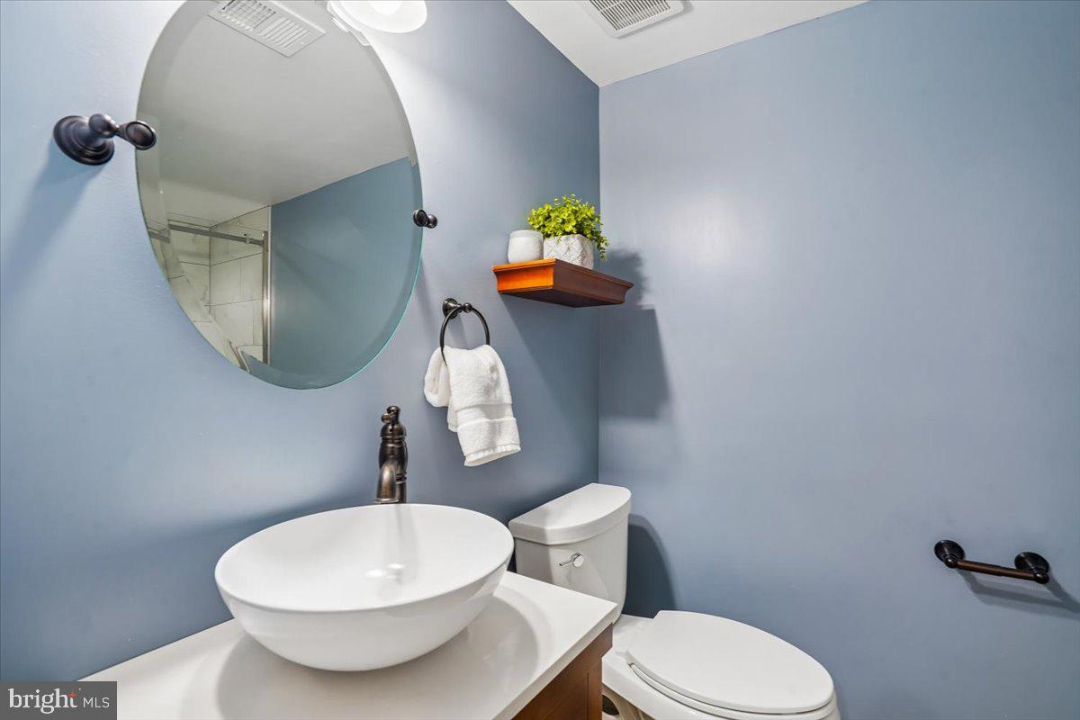 2021 Winged Foot Court Reston, VA 20191 - Photo 28 of 40 Lower level renovated bath w/glass doored shower