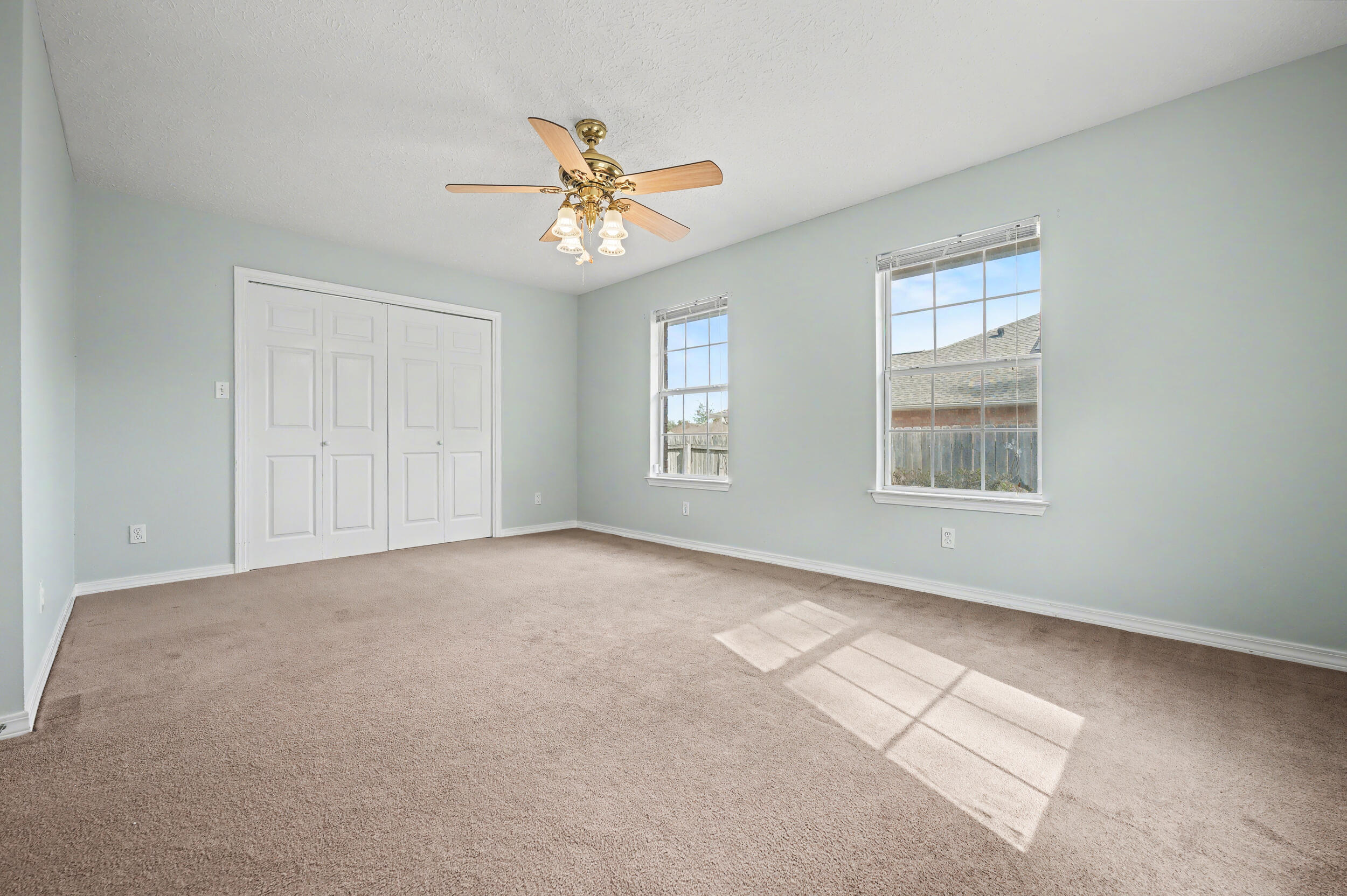 5127 Brookside Drive Pace, FL 32571 - Photo 14 of 25 a view of an empty room with a window