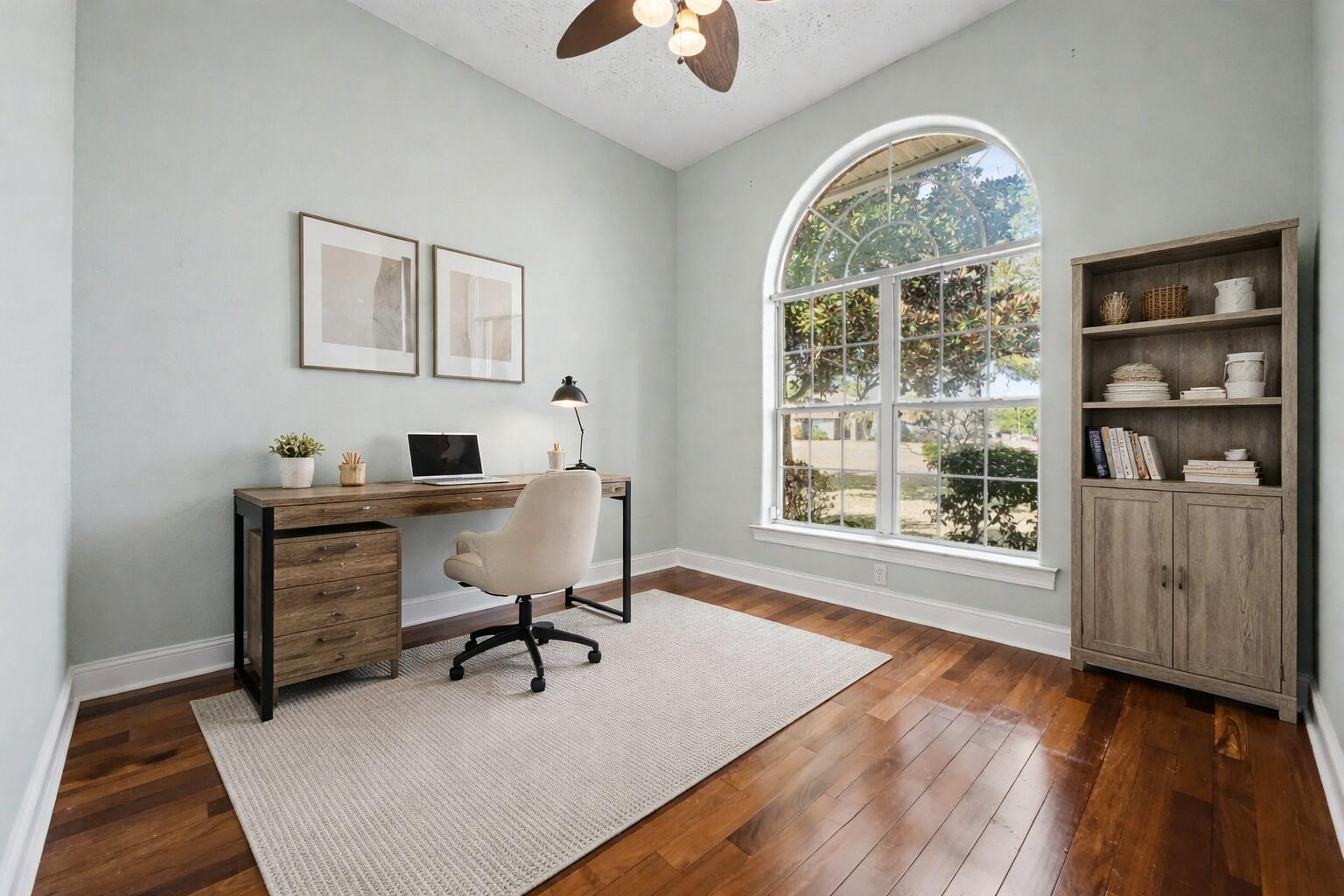 5127 Brookside Drive Pace, FL 32571 - Photo 17 of 25 a view of a workspace with furniture and a window