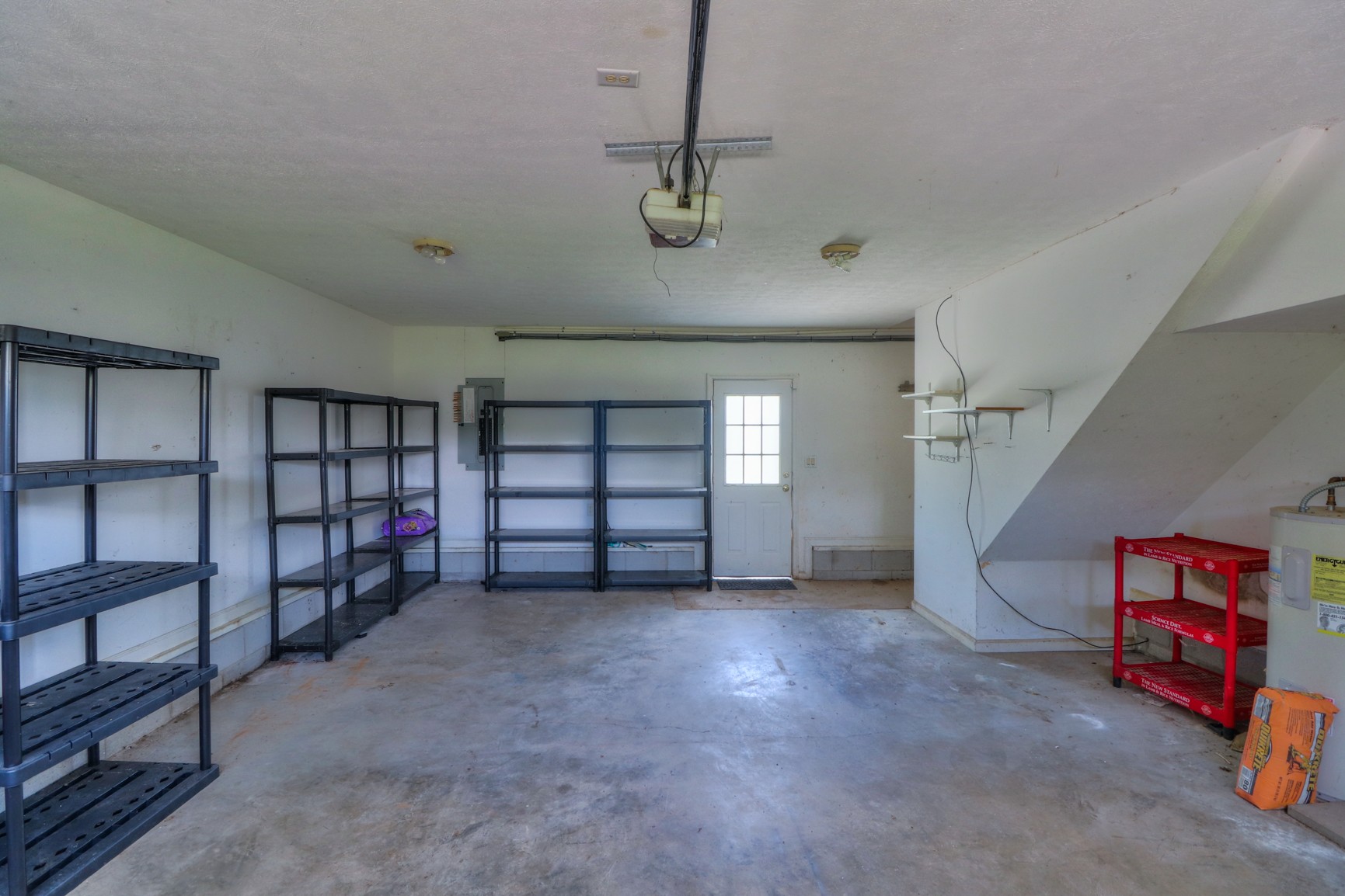 363 Cave Springs Road Lebanon, TN 37087 - Photo 22 of 28 a view of empty room with windows and cabinet