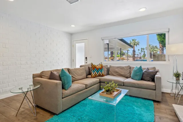 a living room with furniture and a couch