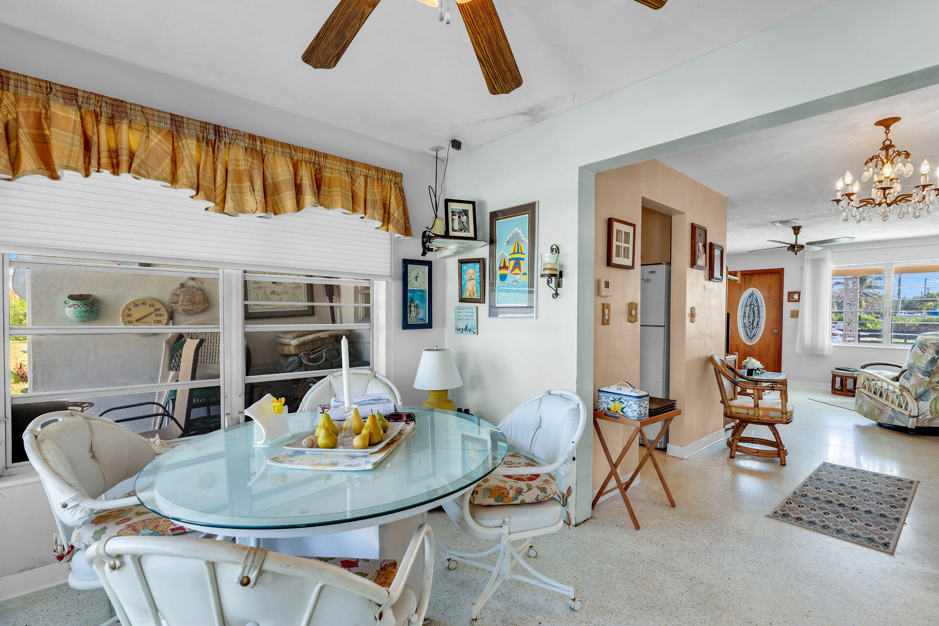 30361 Harding Road Big Pine Key, FL 33043 - Photo 23 of 33 a dining room with furniture a rug and wooden floor
