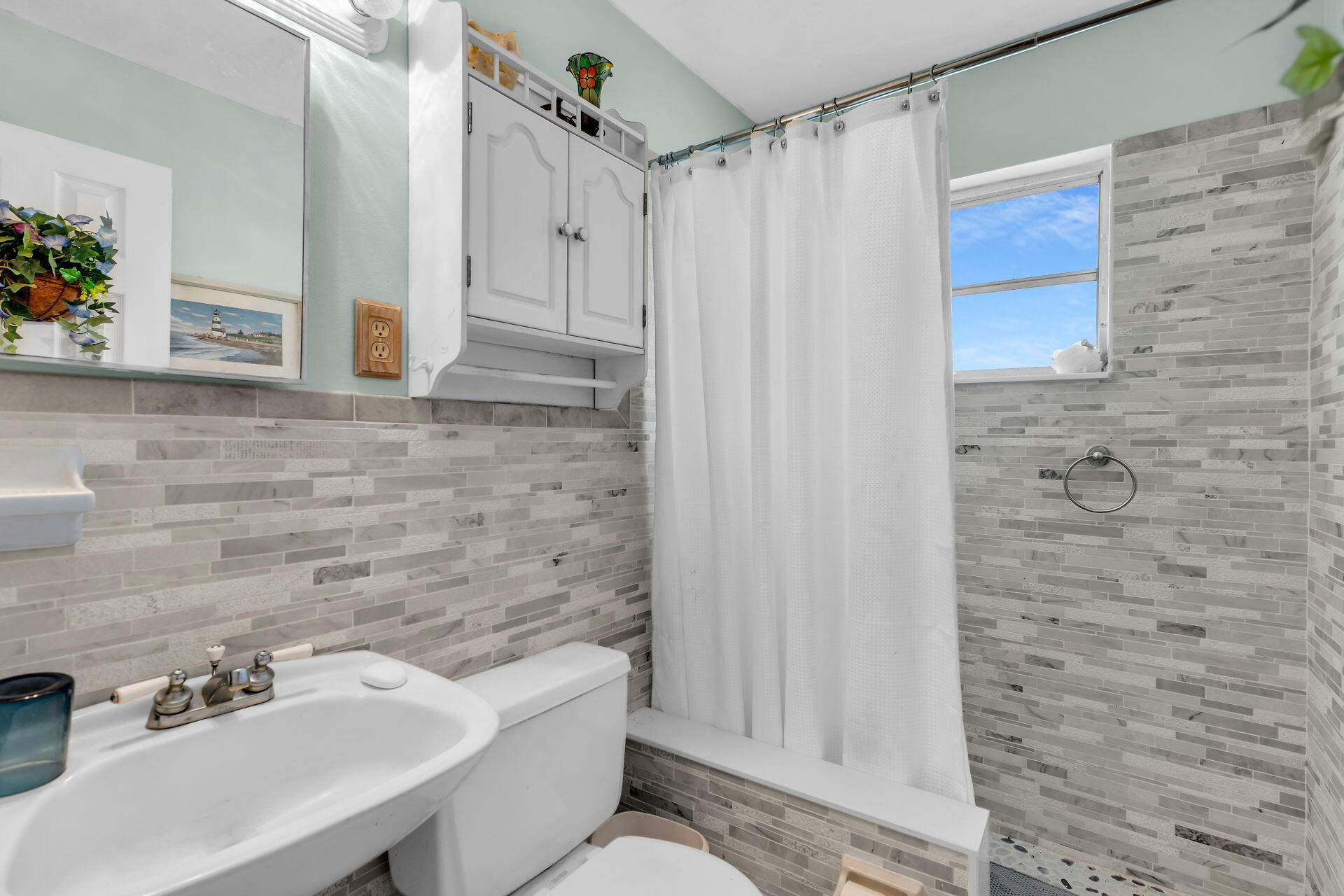 30361 Harding Road Big Pine Key, FL 33043 - Photo 30 of 33 a bathroom with a bathtub and shower