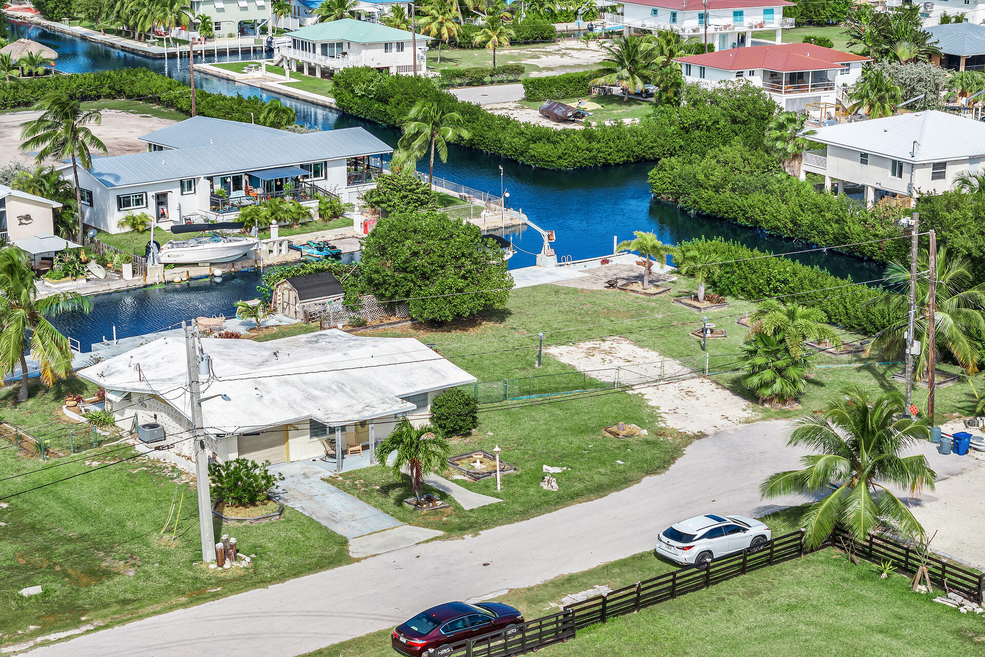 30361 Harding Road Big Pine Key, FL 33043 - Photo 8 of 33 an aerial view of a house with swimming pool a yard and a patio