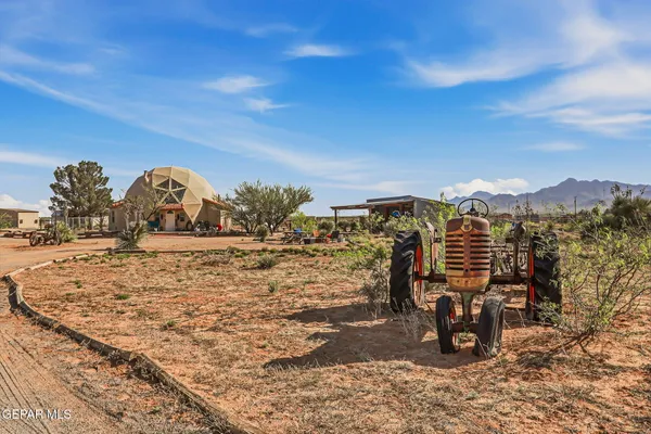 a kitchen with stainless steel appliances granite countertop a sink and a stove