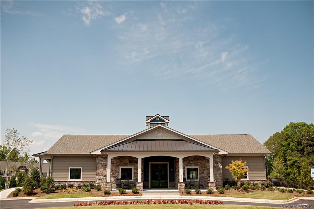 4150 Perth Road, Unit 247 Indian Land, SC 29707 - Photo 2 of 3 a front view of a building and a yard