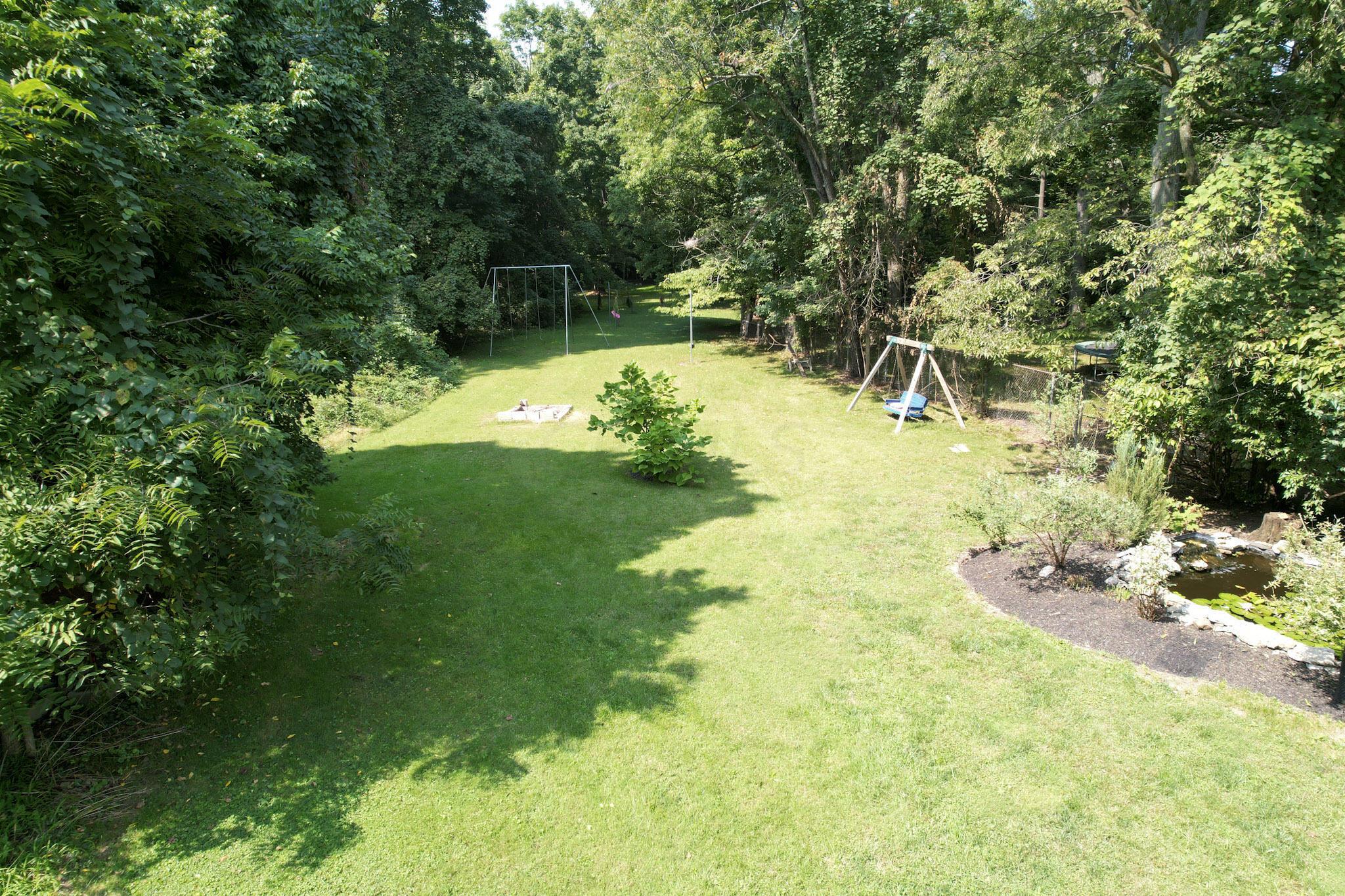 6721 Dublin Road Dublin, OH 43017 - Photo 53 of 74 Back Yard with Industrial Grade Play Gyms