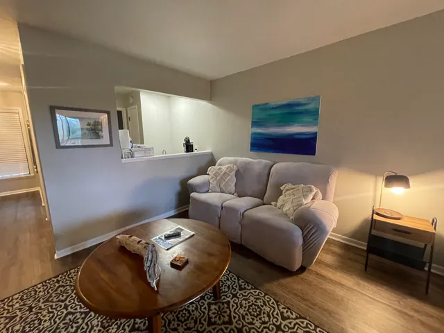 a living room with furniture and a couch