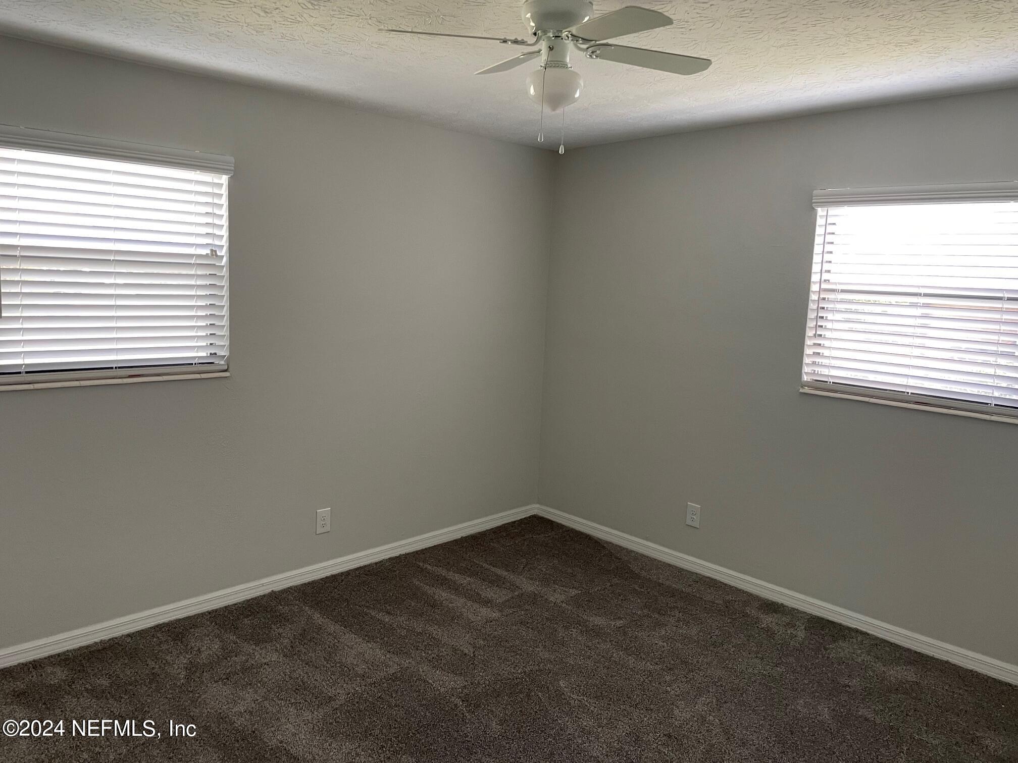 440 Sargo Road Atlantic Beach, FL 32233 - Photo 13 of 15 an empty room with a window