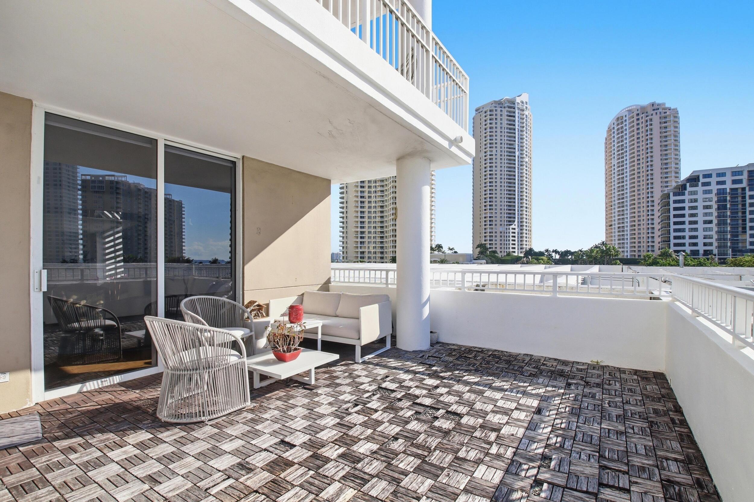 701 Brickell Key Boulevard, Unit 610 Miami, FL 33131 - Photo 19 of 40 a room with furniture and window