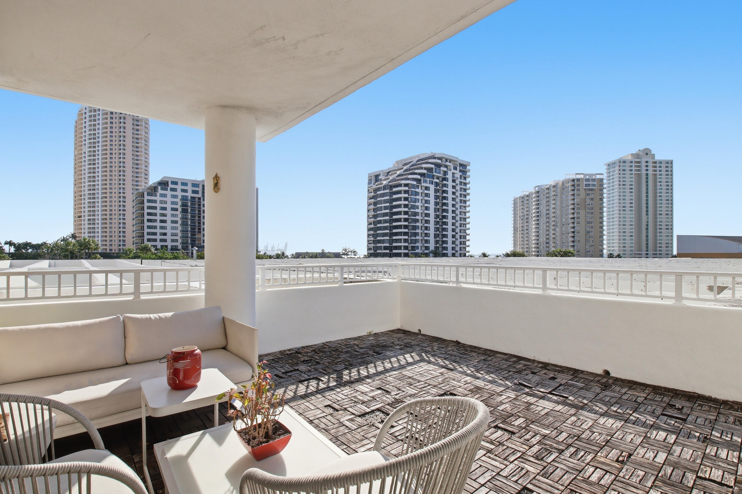 701 Brickell Key Boulevard, Unit 610 Miami, FL 33131 - Photo 22 of 40 a living room with furniture and a window