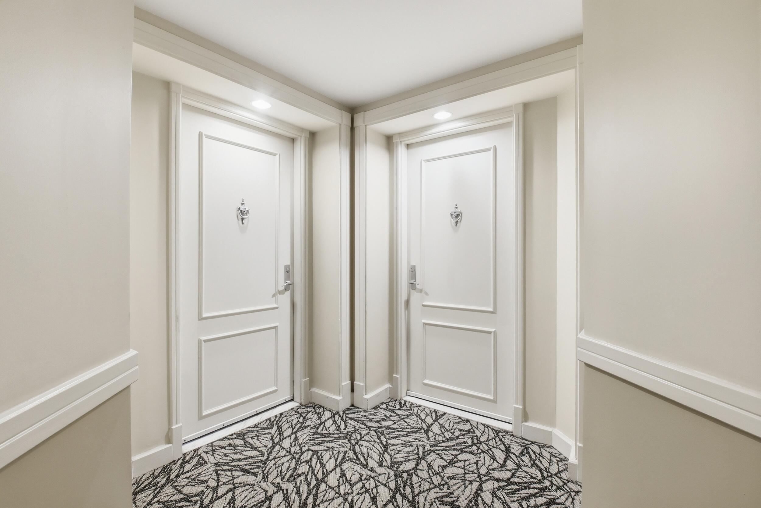 701 Brickell Key Boulevard, Unit 610 Miami, FL 33131 - Photo 24 of 40 a view of a hallway with closet and a window